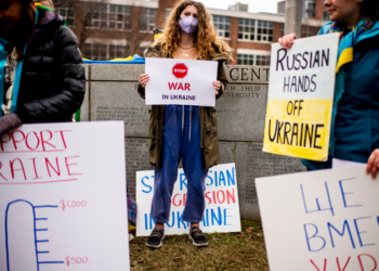 Ukrainian Cultural Club gather on Centennial Common in response to Russia invasion on Feb. 24, 2022. Photo by Matthew Modoono/Northeastern University