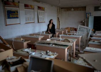 "What happened is a tragedy. I have already cried out about everything I lost. I miss my school, friends, and teachers." said student, 16, as she views her former classroom that was bombed by Russian forces. Photo by Emilio Morenatti / AP