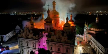 Firefighters work at a site of the Dormition Cathedral of the Kyiv Pechersk Lavra monastery, which burns after it was hit during Russian missile and drone strikes, in Kyiv, June 15, 2026. Ukrainian Culture Ministry/Handout/Reuters