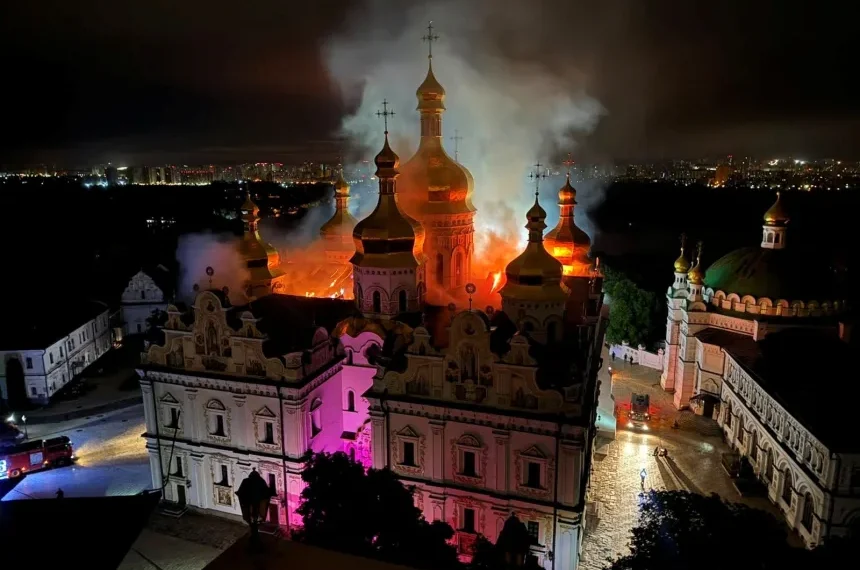 Firefighters work at a site of the Dormition Cathedral of the Kyiv Pechersk Lavra monastery, which burns after it was hit during Russian missile and drone strikes, in Kyiv, June 15, 2026. Ukrainian Culture Ministry/Handout/Reuters
