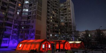 A government-run humanitarian aid point in Kyiv has tents where residents can warm up, charge their devices, and get hot drinks and psychological support during the power blackout, which comes after energy infrastructure was hit by recent Russian strikes. Valentyn Ogirenko/Reuters